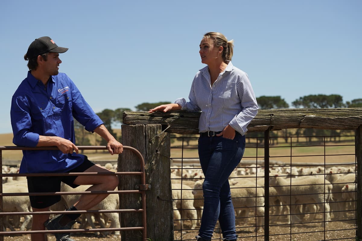 Area Manager Virginia Croker with sheep and wool producer James Milson, of Yarra